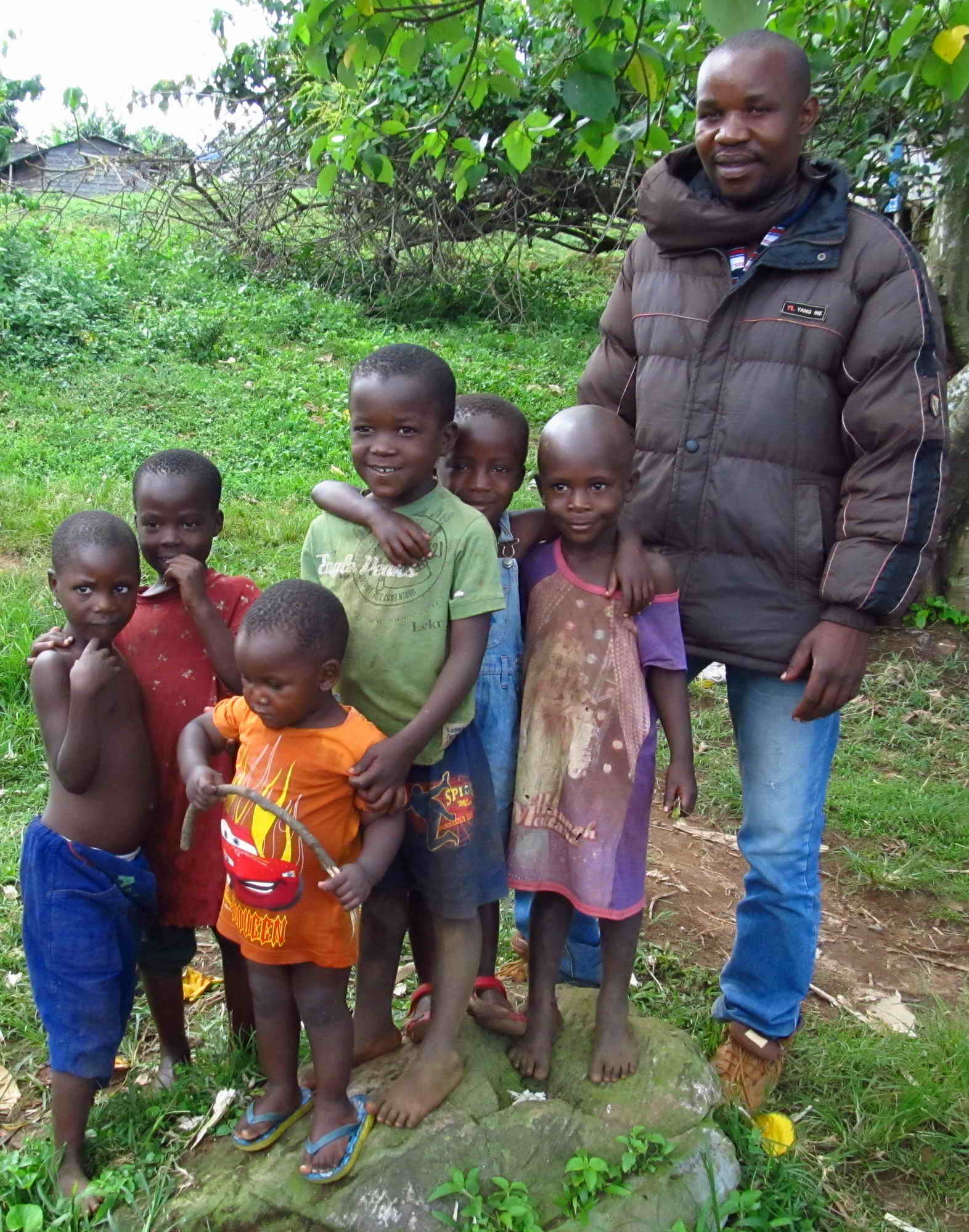 Thomson with children in the small village Dajje